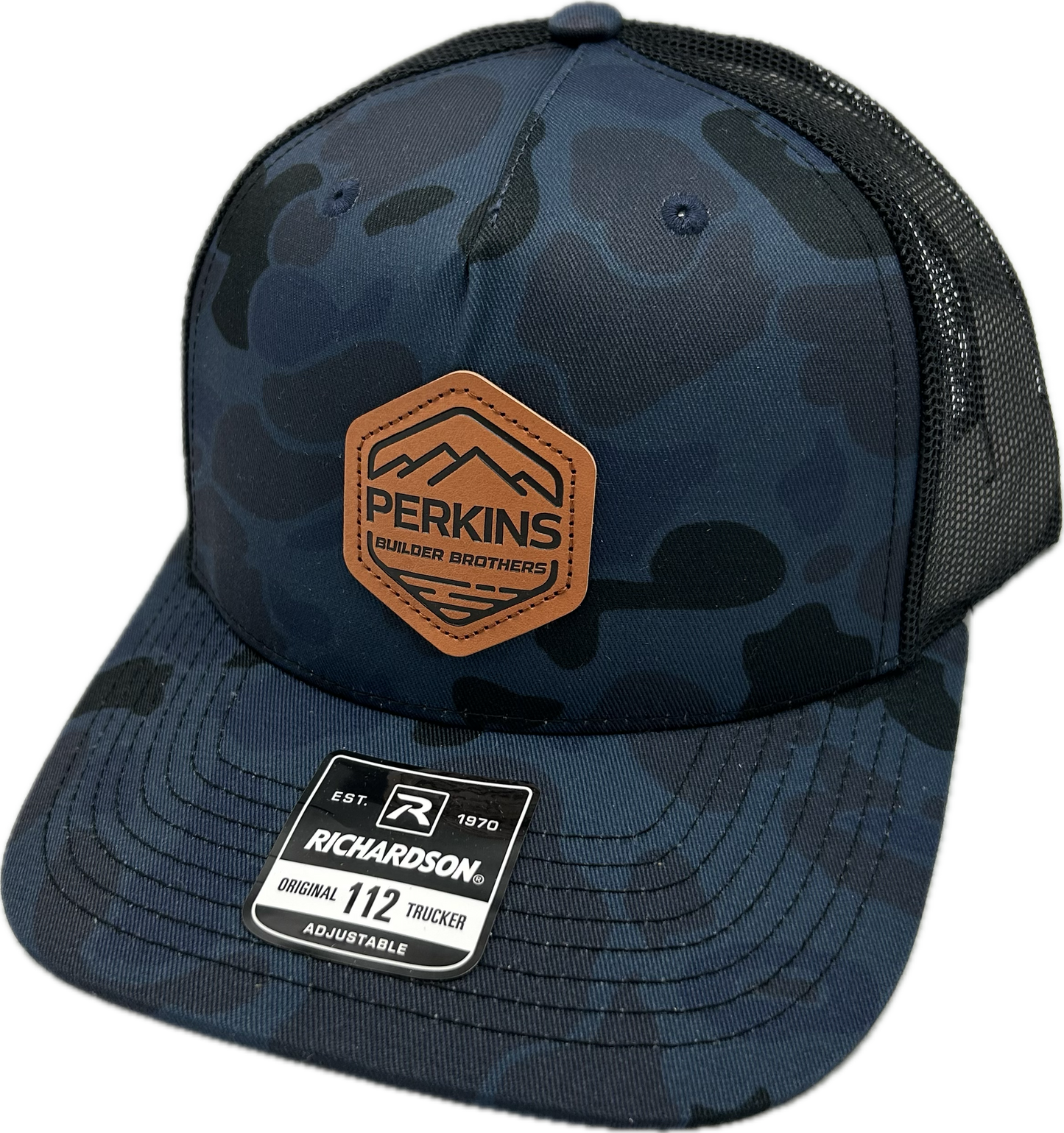 Debossed Faux Leather Patch - Richardson 112PFP Snapback Trucker Hat - Admiral Duck Camo/Black - Perkins Builder Brothers