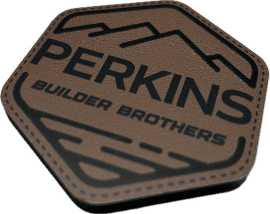 Imán de parche de piel sintética - Logotipo de Perkins Builder Brothers